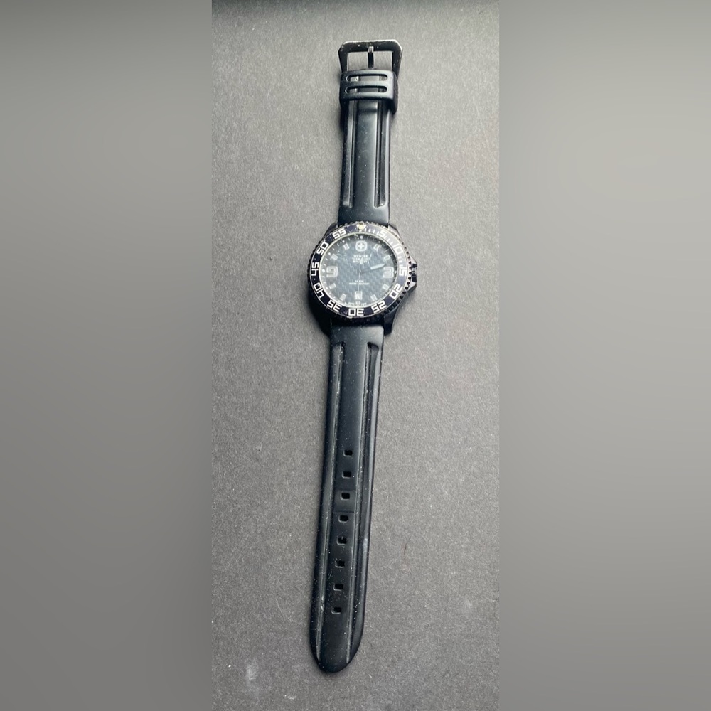 Wegner Swiss Military black watch. Needs battery.